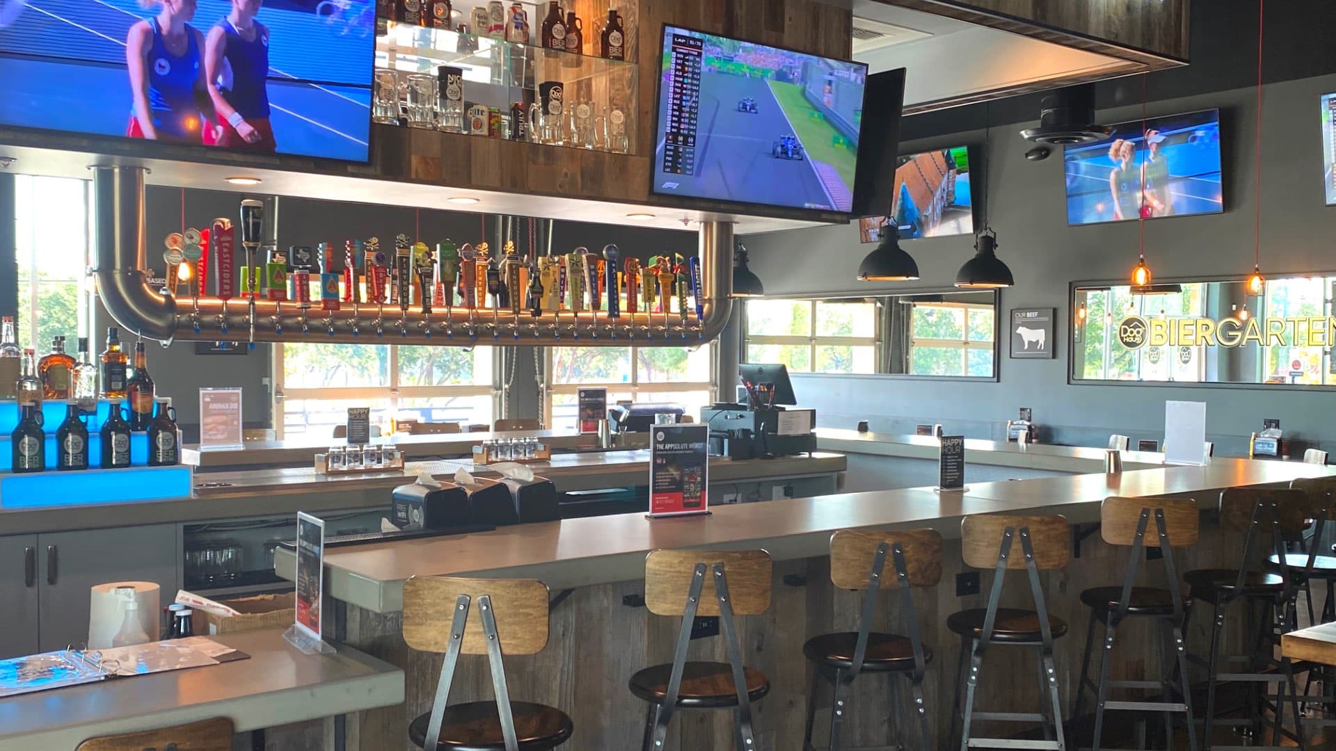 Interior of Dog Haus Four Points, with comfortable bar seating and easy viewing TVs