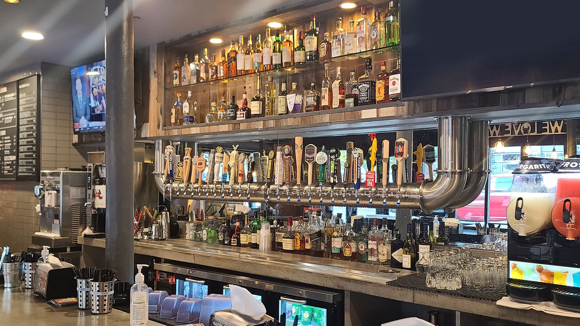 Dog Haus Bethesda with a full bar and many bar taps.